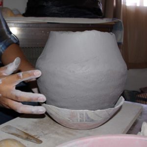 Shaping the pot from outside