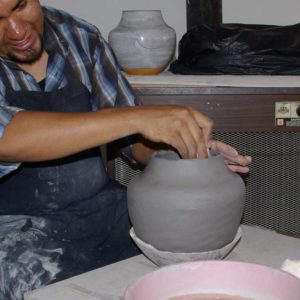 Stretching and shaping the pot