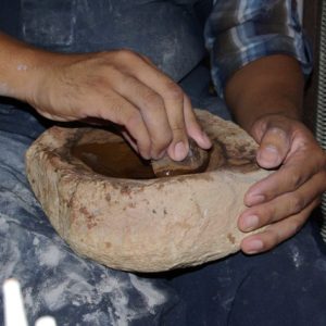 Grinding more of the brown paint stone