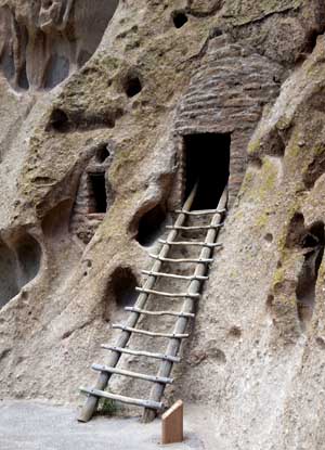 Ladder leading into a home dug into the side of the pumice cliff