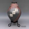 Efrain Lucero, cjcg2k056: Polychrome jar with a geometric design