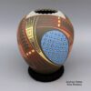 Lidia Lucero, cjcg2k063: Polychrome jar with cut opening and geometric design