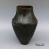 Alice Cling, cmnv2k211, Brown jar with a carved biyo