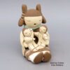 Stella Teller, lkle2l329: Polychrome storyteller with two children