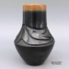 Dora Tse Pe, lksi2l332: Black jar with a carved avanyu design - Image 2