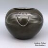 Toni Roller, mcsc2h160, Black bowl with carved bear paw design