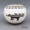 Emma Lewis, nuac2m066: Black-on-white bowl with a Mimbres skunk and geometric design