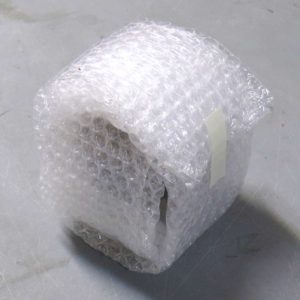 Turn the piece 90 degrees and put a second qrap of bubble wrap around it twice