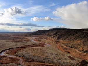 The Jemez River flows across Santa Ana Pueblo along the southern edge of the Jemez Mountains