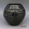 LuAnn Tafoya, spsc2k110: Black jar with carved design