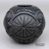 Linda Tafoya, spsc3c063, Jar carved with a geometric design