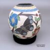 Melissa Tena, zzcg3b108m6, Polychrome jar with a sgraffito and painted butterfly, branch, flower, leaf, berry, and geometric design